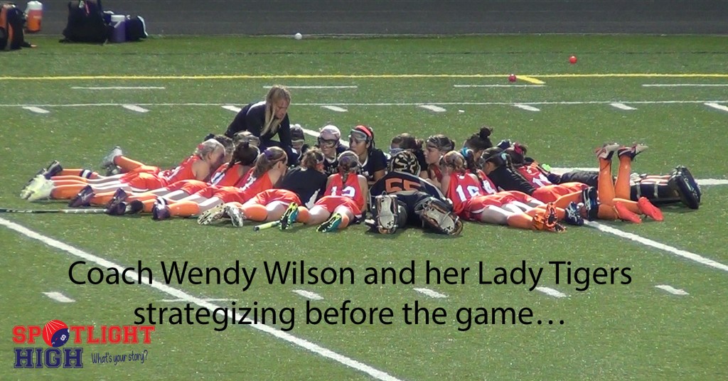 Coach Wendy Wilson and her Lady Tiger strategizing before the game…